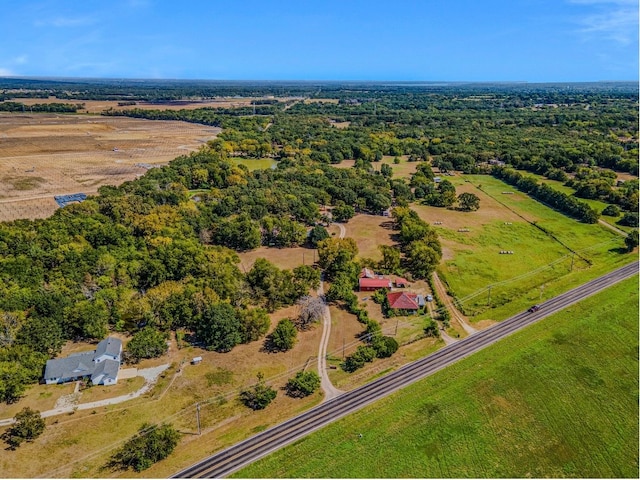 birds eye view of property featuring a rural view