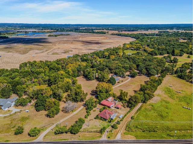 birds eye view of property featuring a rural view