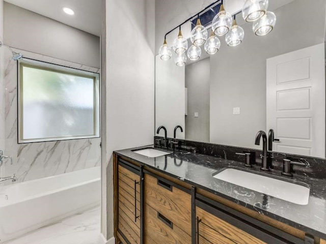 bathroom with vanity and shower / tub combination