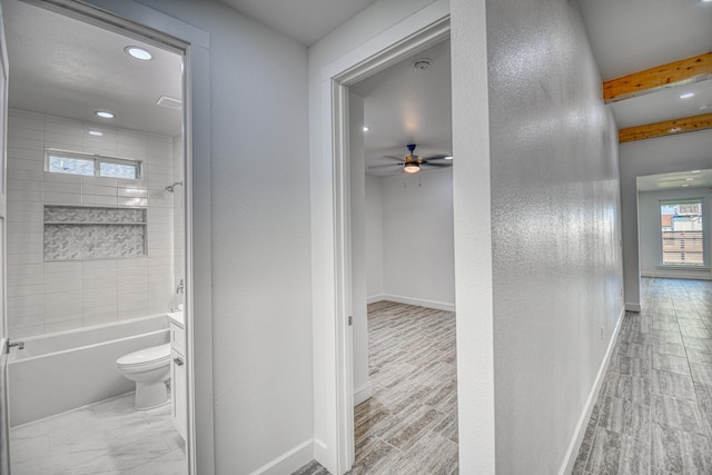 corridor featuring recessed lighting, baseboards, beam ceiling, and wood finished floors