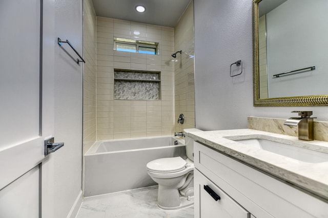 full bath with vanity, toilet, marble finish floor, a textured wall, and tub / shower combination