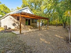 exterior space with a patio area