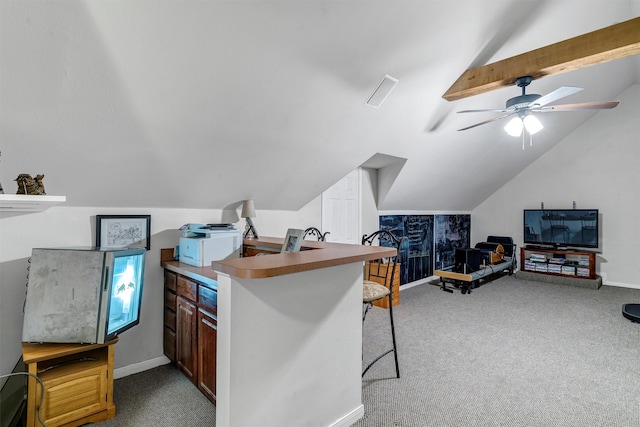 home office featuring vaulted ceiling with beams, carpet, and ceiling fan