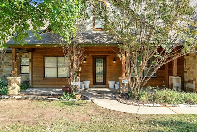 view of front of home featuring covered porch