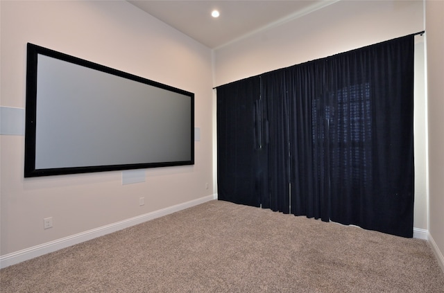 cinema room with carpet flooring