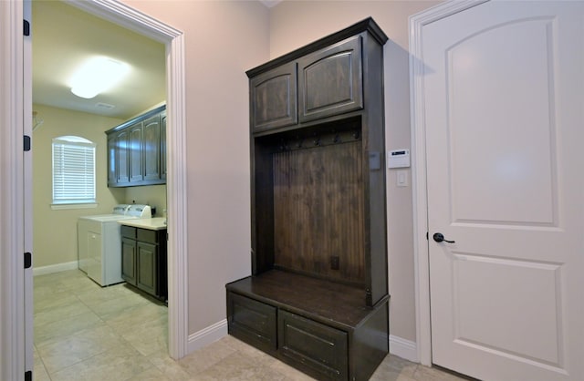 4095 Bridgecreek Dr, Rockwall, TX 75032 - mudroom featuring washer and dryer and baseboards