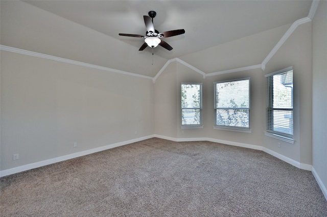 unfurnished room featuring lofted ceiling, crown molding, carpet flooring, and ceiling fan