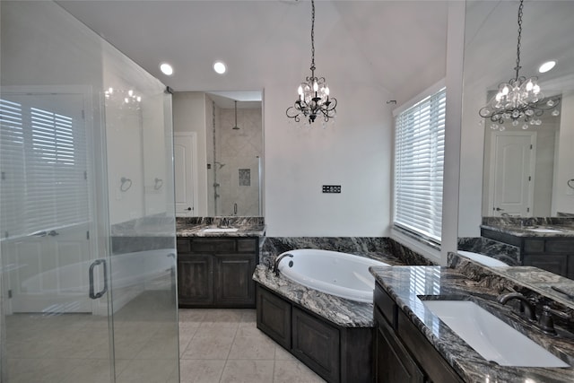 bathroom featuring vanity, plus walk in shower, tile patterned floors, and vaulted ceiling