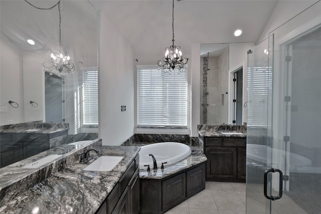 bathroom with vanity, lofted ceiling, shower with separate bathtub, and tile patterned flooring