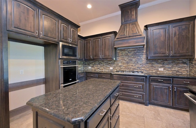 4095 Bridgecreek Dr, Rockwall, TX 75032 - kitchen featuring ornamental molding, backsplash, appliances with stainless steel finishes, and dark brown cabinetry
