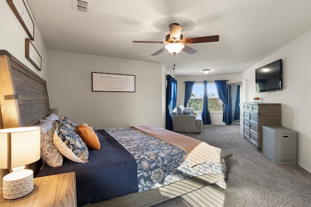 bedroom with ceiling fan and carpet floors