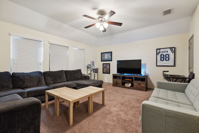 living room featuring ceiling fan and carpet floors