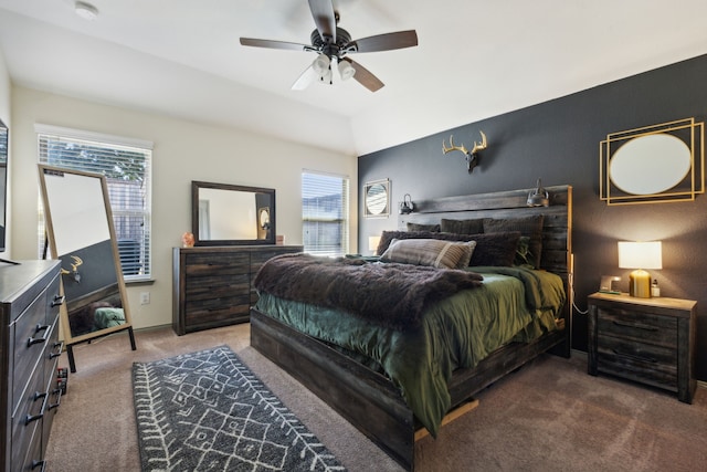 carpeted bedroom featuring ceiling fan