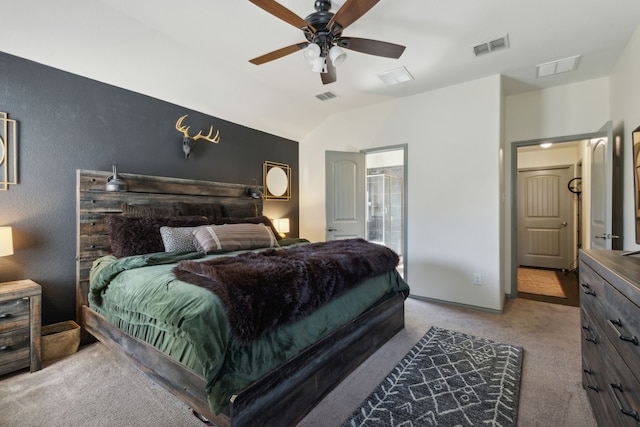 carpeted bedroom featuring connected bathroom, ceiling fan, and lofted ceiling