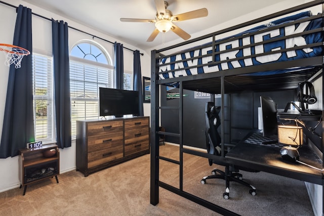 bedroom featuring ceiling fan and light colored carpet