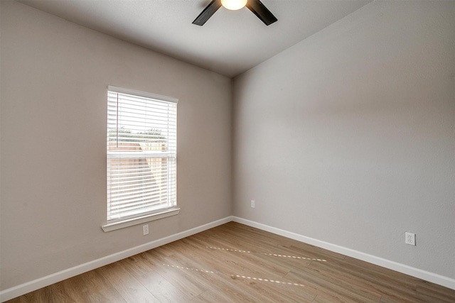 716 SE 7th Ave, Mineral Wells, TX 76067 - empty room with a ceiling fan, light wood-type flooring, and baseboards