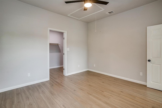 716 SE 7th Ave, Mineral Wells, TX 76067 - empty room with attic access, ceiling fan, light wood finished floors, and baseboards