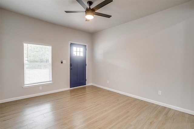 716 SE 7th Ave, Mineral Wells, TX 76067 - unfurnished room featuring light wood-style floors, ceiling fan, and baseboards