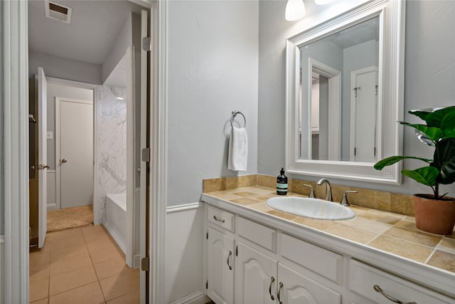 bathroom with vanity and tile patterned floors