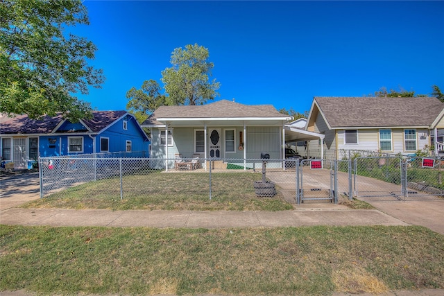 bungalow featuring a porch and a carport