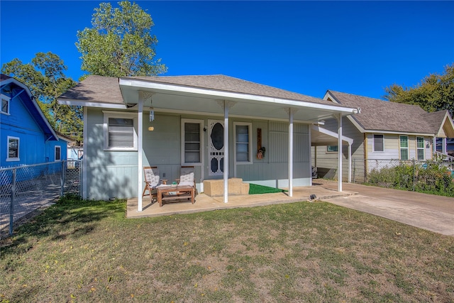 bungalow with a front lawn and a porch