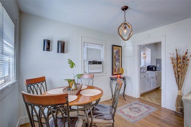 dining room with cooling unit