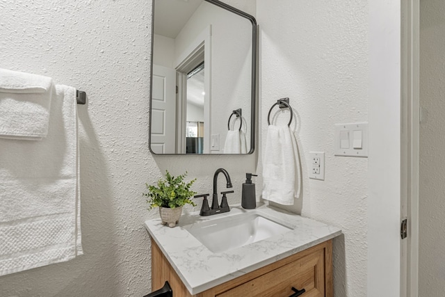 110 Fawn Trl, Mabank, TX 75156 - bathroom featuring vanity and a textured wall