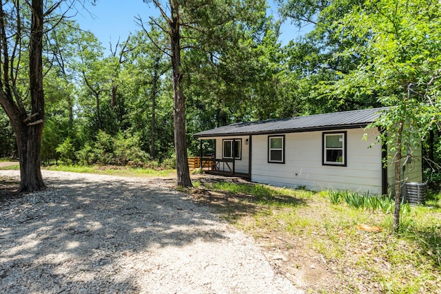 110 Fawn Trl, Mabank, TX 75156 - view of front facade with metal roof and central AC