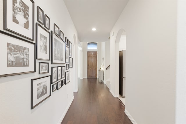 hall with dark hardwood / wood-style flooring