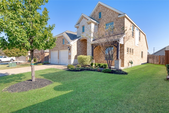 front facade with a front yard and a garage