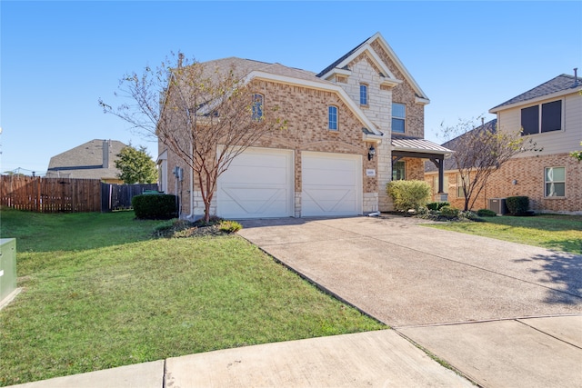 front of property with a front yard and a garage