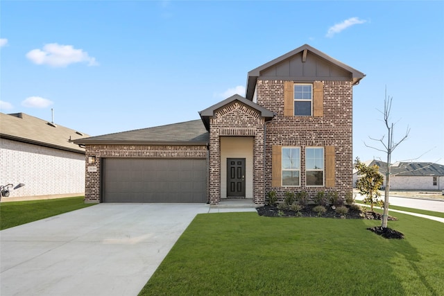 view of front of property featuring a garage and a front lawn