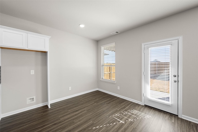 interior space with dark wood-type flooring