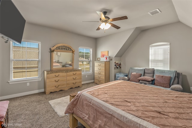 carpeted bedroom featuring lofted ceiling and ceiling fan