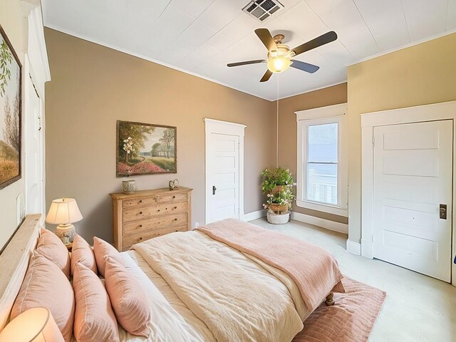 unfurnished bedroom with ceiling fan and light carpet