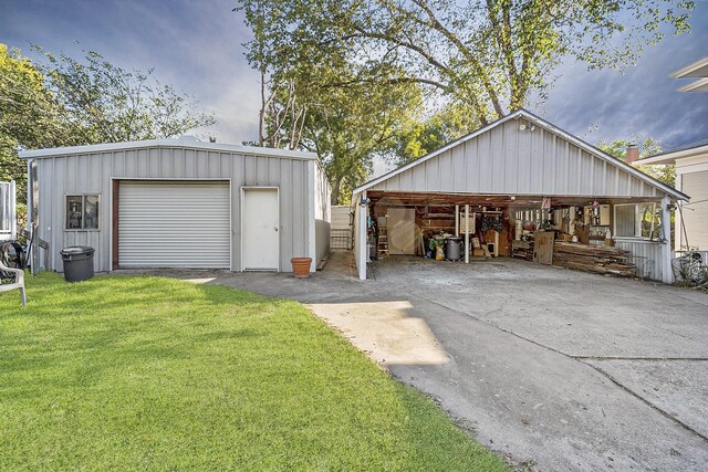 garage featuring a yard