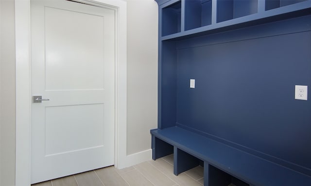 mudroom with hardwood / wood-style flooring