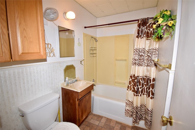 full bathroom with vanity, toilet, and shower / bath combination with curtain