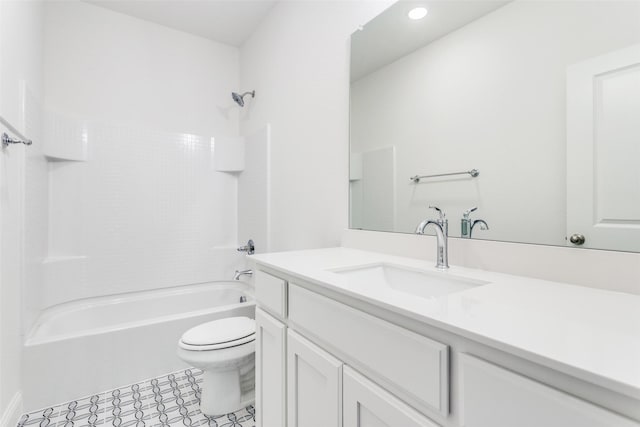 full bath featuring washtub / shower combination, recessed lighting, vanity, and toilet