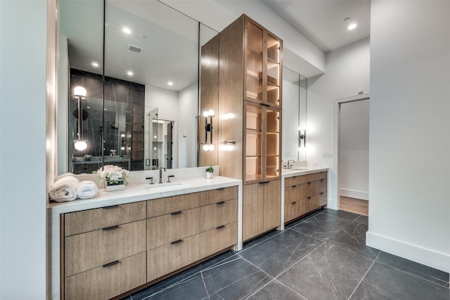 bathroom with vanity and walk in shower