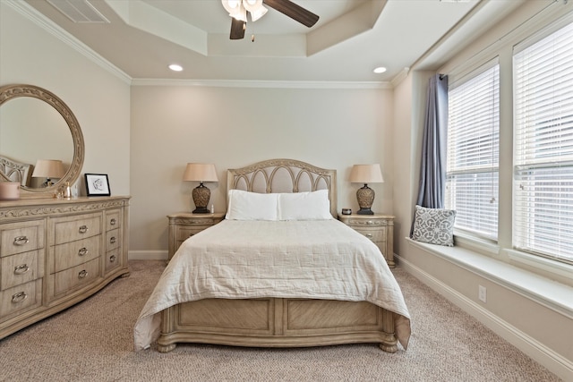 bedroom with ceiling fan, light carpet, and multiple windows