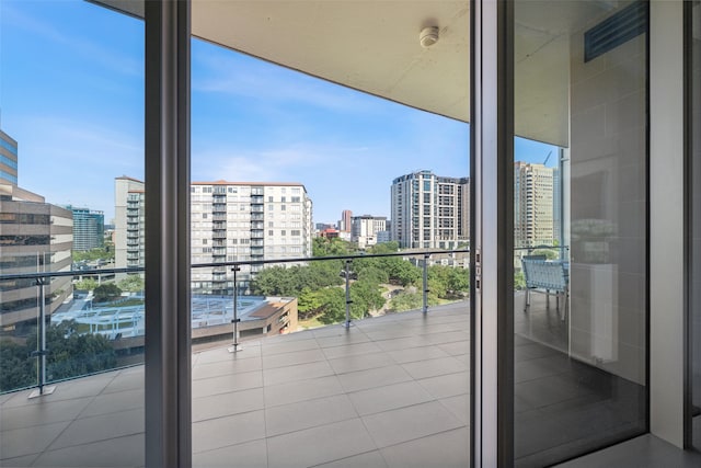 balcony featuring a city view
