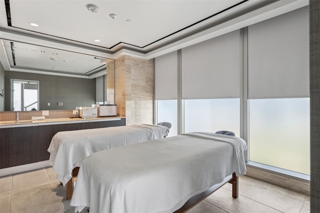 bedroom featuring a sink