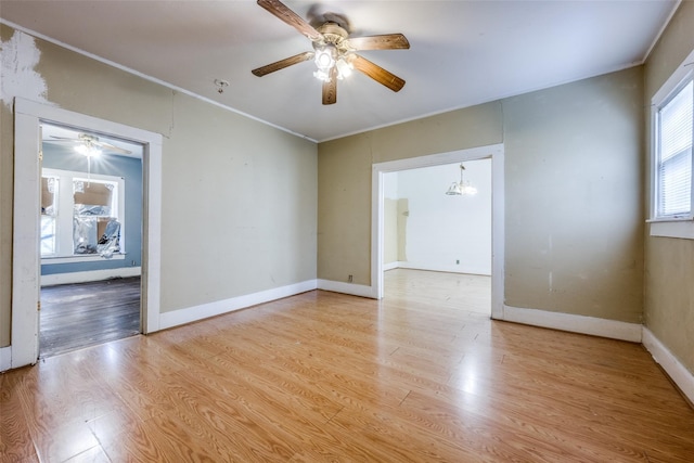 unfurnished room with light hardwood / wood-style floors and ceiling fan