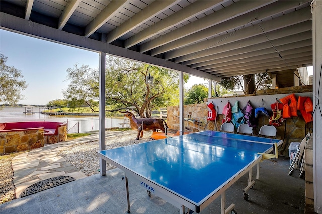 view of patio / terrace featuring a water view