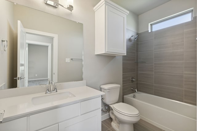 full bathroom featuring vanity, toilet, wood-type flooring, and tiled shower / bath