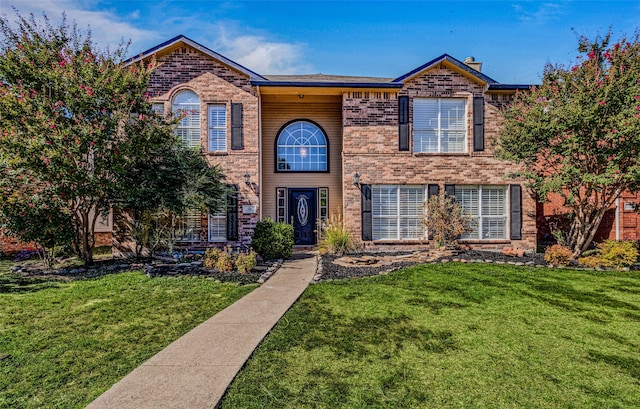 view of front of property with a front yard