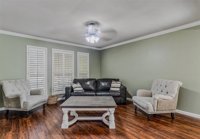 living room featuring dark wood-type flooring, ceiling fan, and crown molding