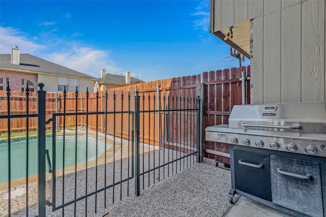 view of patio / terrace with a swimming pool