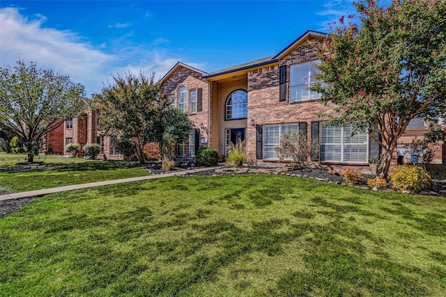 view of front of home featuring a front yard